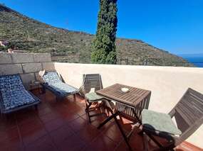 Preiswertes kleines Ferienhaus mit Terrasse & Meerblick in Wanderlage