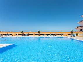 Ferienwohnung an der Playa La Arena | Pool und Meerblick-Balkon
